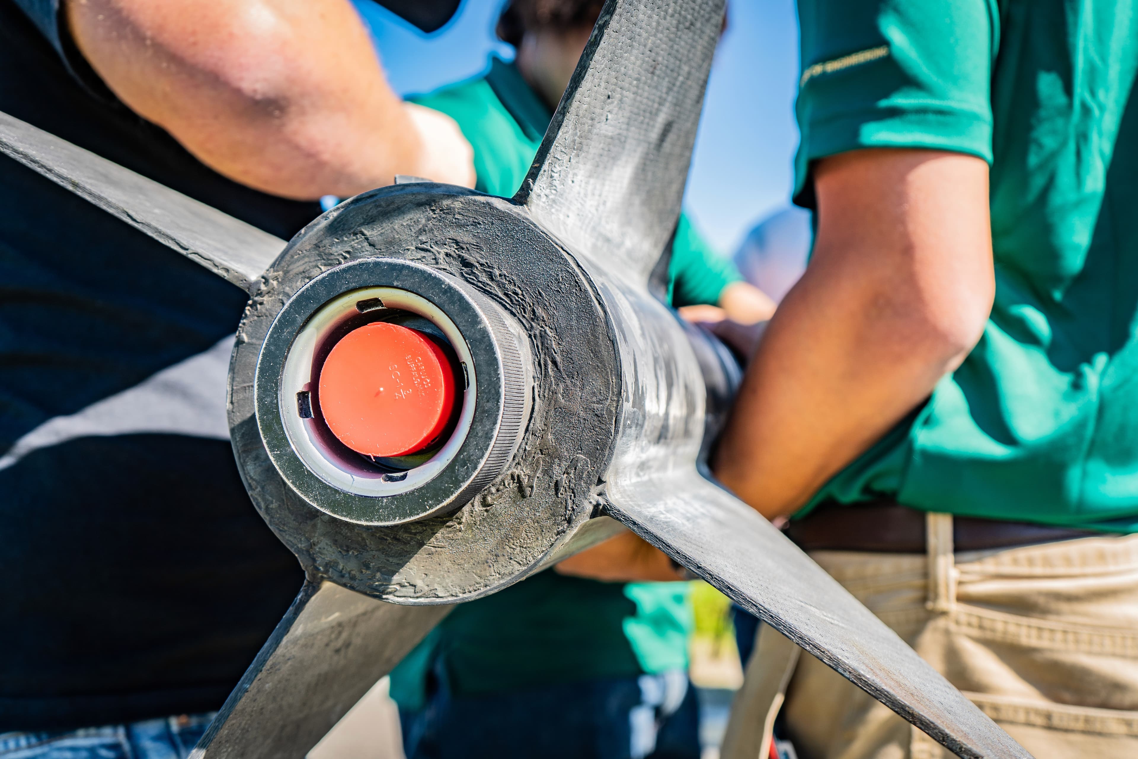 Team member working on rocket assembly